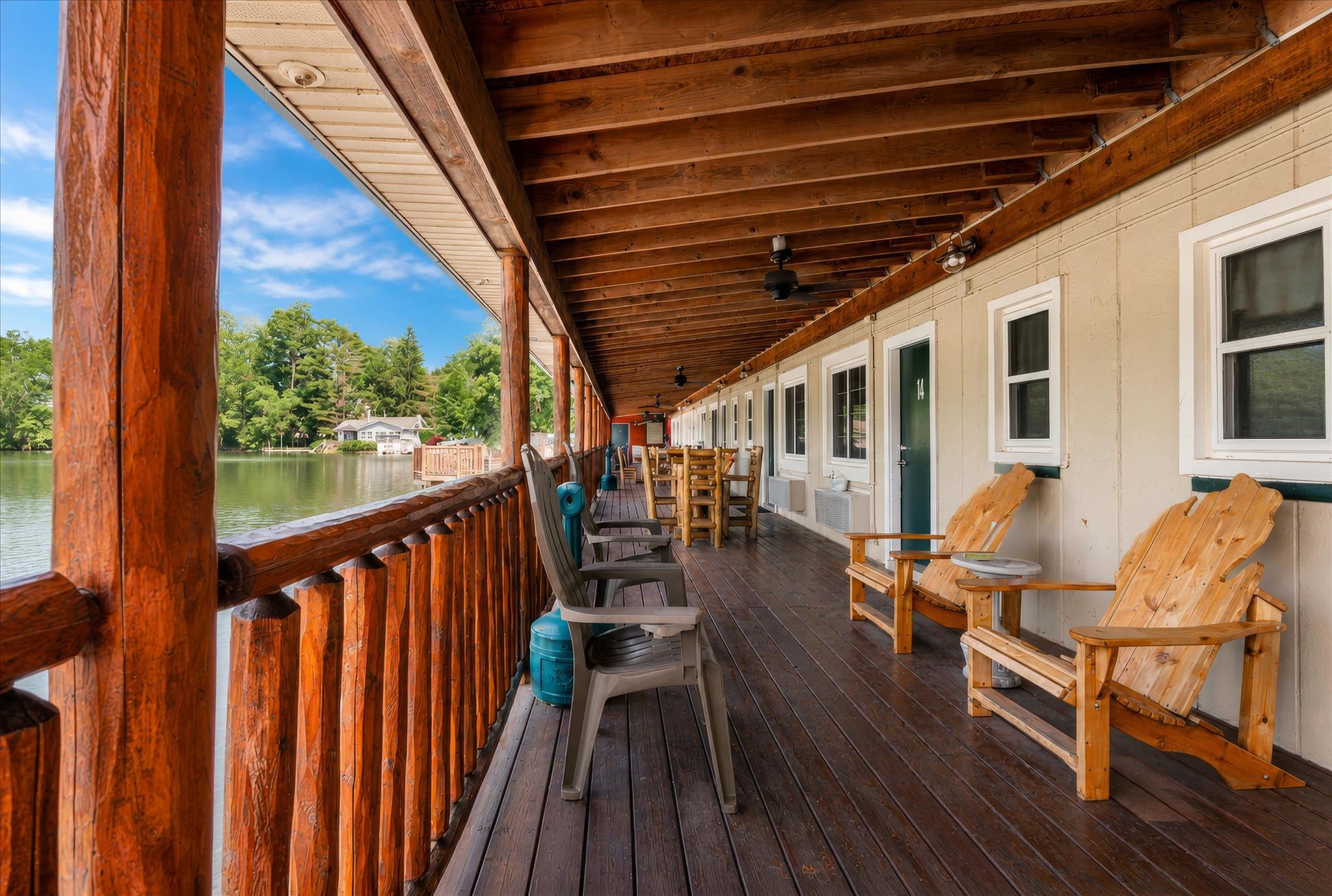 Lakefront setting and covered deck at Olde Mill Inn of Clarkston