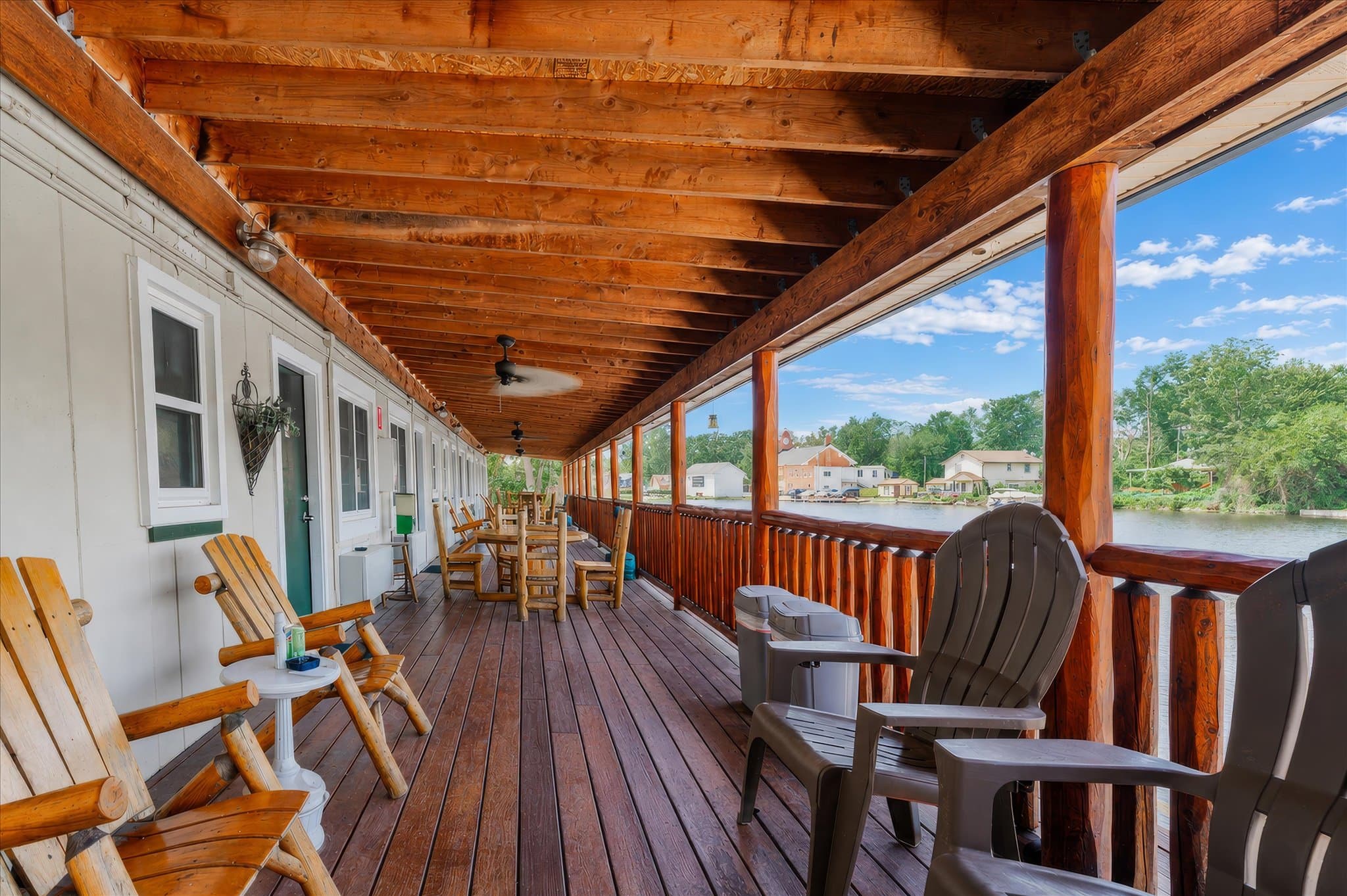 Lakefront setting and covered deck at Olde Mill Inn of Clarkston